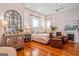 Inviting main bedroom with a cozy seating area, fireplace, and stylish furnishings at 2173 Conyers Se St, Covington, GA 30014