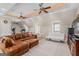 Spacious finished bonus room with multiple ceiling fans, lots of seating and an open floorplan at 2173 Conyers Se St, Covington, GA 30014