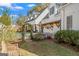A landscaped backyard with a view of the home's exterior and pool at 2173 Conyers Se St, Covington, GA 30014