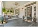 Relaxing front porch with comfortable seating and charming details at 2173 Conyers Se St, Covington, GA 30014