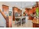 Expansive kitchen with a center island, stainless steel appliances, and abundant cabinet space at 2173 Conyers Se St, Covington, GA 30014