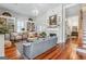 Bright, elegant living room with built-in shelving, fireplace, and hardwood floors at 2173 Conyers Se St, Covington, GA 30014