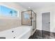 Bathroom with soaking tub, glass-enclosed shower, and modern fixtures at 279 Deer Creek Run # 4, Moreland, GA 30259