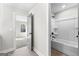 This spare bathroom has a shower/tub combo and a tile floor at 279 Deer Creek Run # 4, Moreland, GA 30259