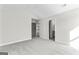 Bright bedroom with neutral walls and carpet flooring, connects to the bathroom at 279 Deer Creek Run # 4, Moreland, GA 30259