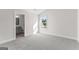 Bedroom featuring neutral walls, carpet flooring, and a window offering natural light at 279 Deer Creek Run # 4, Moreland, GA 30259
