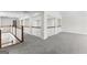 View of the upper level with wood and white railings, soft carpet flooring and neutral paint at 279 Deer Creek Run # 4, Moreland, GA 30259