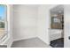 Walk-in closet with shelving and large windows providing ample light at 279 Deer Creek Run # 4, Moreland, GA 30259