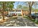 Charming townhomes featuring manicured lawns and convenient driveway parking at 5599 Fair Creek Way, Lithonia, GA 30038