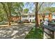 Well-maintained townhomes with neatly landscaped front yards and ample parking spaces at 5599 Fair Creek Way, Lithonia, GA 30038