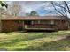 Home's backyard features a spacious deck and large grassy area at 2140 Indian Hill Rd, Jonesboro, GA 30236