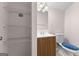 Cozy bathroom with single vanity, toilet, and wire shelving at 90 Hazelridge Ln, Sharpsburg, GA 30277