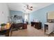 Bright room featuring a sewing machine and multiple shelves and storage at 90 Hazelridge Ln, Sharpsburg, GA 30277