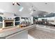 View of open concept space including a kitchen, living room with a fireplace, and a skylight at 90 Hazelridge Ln, Sharpsburg, GA 30277
