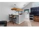 A charming living room features a bar area, comfortable seating, and a window at 90 Hazelridge Ln, Sharpsburg, GA 30277