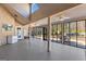 Spacious screened-in patio with ceiling fans and backyard access at 90 Hazelridge Ln, Sharpsburg, GA 30277