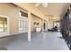 Covered patio featuring ceiling fans, plenty of space, and backyard views at 90 Hazelridge Ln, Sharpsburg, GA 30277