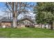 The backyard features a patio area with tables, chairs and a bench at 100 Cross Plains Hulett Rd, Carrollton, GA 30116
