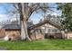 The backyard features a patio area with tables, chairs and a bench at 100 Cross Plains Hulett Rd, Carrollton, GA 30116