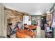 Basement featuring tile flooring, exercise bike and a table with four chairs at 100 Cross Plains Hulett Rd, Carrollton, GA 30116