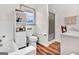 Bathroom features a bathtub, toilet, and enclosed glass shower at 100 Cross Plains Hulett Rd, Carrollton, GA 30116