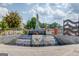 Elaborate water fountain with cascading tiers and a memorial obelisk at 5808 Deer Crossing Dr, Sugar Hill, GA 30518
