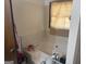 Bathroom featuring a large soaking tub and ample counter space, perfect for relaxation at 222 Farmbrook Pkwy, Stockbridge, GA 30281