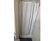 Practical bathroom shower stall and white curtain, offering a clean and simple design at 222 Farmbrook Pkwy, Stockbridge, GA 30281