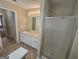Bathroom with a double sink vanity and a walk-in shower at 1222 Snapping Shoals Rd, Mcdonough, GA 30252