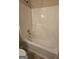 A clean white bathtub and shower at 1222 Snapping Shoals Rd, Mcdonough, GA 30252