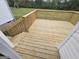 New wood deck offers outdoor entertaining space, overlooking the backyard at 1222 Snapping Shoals Rd, Mcdonough, GA 30252