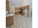 Efficient kitchen layout with tile floors and stainless steel appliances at 1222 Snapping Shoals Rd, Mcdonough, GA 30252