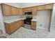 Well-equipped kitchen with stainless steel appliances and plenty of cabinet space at 1222 Snapping Shoals Rd, Mcdonough, GA 30252