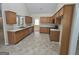 Spacious kitchen featuring ample cabinetry and a large stainless steel sink at 1222 Snapping Shoals Rd, Mcdonough, GA 30252