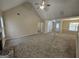 A living room with carpet flooring and a fireplace at 1222 Snapping Shoals Rd, Mcdonough, GA 30252