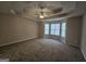 Large main bedroom with tray ceilings and lots of natural light at 1222 Snapping Shoals Rd, Mcdonough, GA 30252