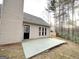 Backyard showing the home's patio and partial wooden fence at 596 Carlton Rd, Palmetto, GA 30268