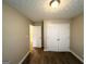 Bedroom with carpeted floors and a standard double door closet at 596 Carlton Rd, Palmetto, GA 30268