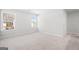 Bedroom features plush carpeting and lots of natural light at 1619 Tide Mill Rd, Cumming, GA 30040