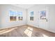 Flex space features wood-look flooring and 2 large windows that provide ample natural light at 1619 Tide Mill Rd, Cumming, GA 30040