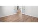 Office features wood-look flooring with large windows and double doors to the foyer at 1619 Tide Mill Rd, Cumming, GA 30040