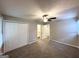 Bedroom includes ceiling fan and entrance to ensuite bathroom at 6635 Hidden Brook Trl, South Fulton, GA 30349