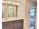 Double vanity bathroom with mirror, lighting and a shower/tub combination at 4841 Walkers Green, Mableton, GA 30126