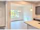 Dining room features wainscoting and natural light from large windows at 4841 Walkers Green, Mableton, GA 30126