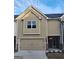 Modern townhouse exterior with two-car garage and neutral siding at 4841 Walkers Green, Mableton, GA 30126