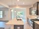 Stylish kitchen with granite countertops, stainless steel appliances and modern fixtures at 4841 Walkers Green, Mableton, GA 30126