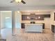 Open-concept kitchen with stainless steel appliances and a center island at 4841 Walkers Green, Mableton, GA 30126
