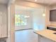 Bright dining room features modern chandelier and chair rail at 4849 Walkers Green, Mableton, GA 30126