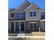 Charming brick and siding home with covered porch, perfect for enjoying the outdoors at 4849 Walkers Green, Mableton, GA 30126