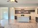 Spacious kitchen and dining area featuring stainless appliances and modern finishes at 4849 Walkers Green, Mableton, GA 30126